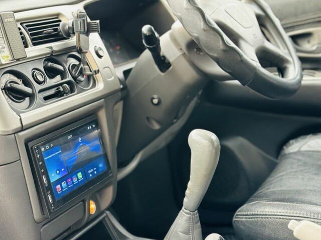 Зеленый Мицубиси Паджеро Спорт, объемом двигателя 2.5 л и пробегом 250 тыс. км за 3850 $, фото 16 на Automoto.ua