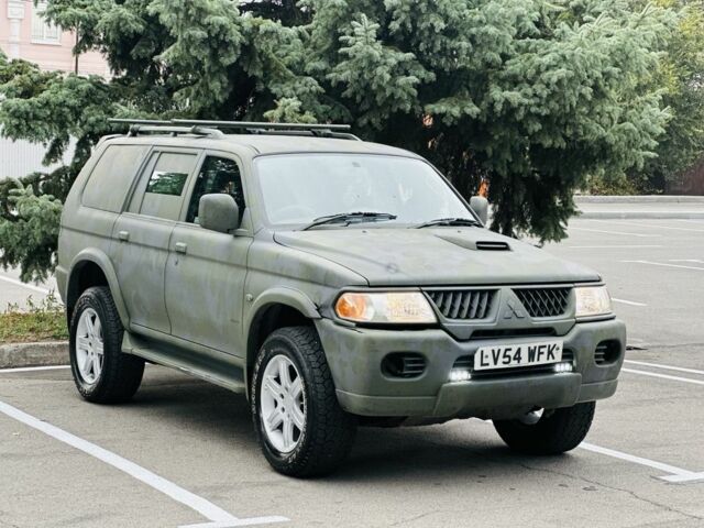 Зеленый Мицубиси Паджеро Спорт, объемом двигателя 2.5 л и пробегом 250 тыс. км за 3850 $, фото 6 на Automoto.ua