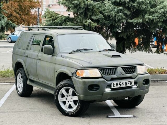 Зеленый Мицубиси Паджеро Спорт, объемом двигателя 2.5 л и пробегом 250 тыс. км за 3850 $, фото 1 на Automoto.ua