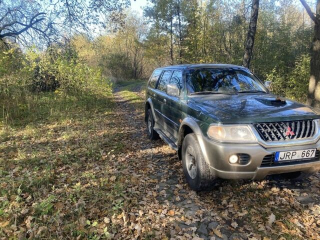 Зеленый Мицубиси Паджеро Спорт, объемом двигателя 2.5 л и пробегом 333 тыс. км за 4900 $, фото 2 на Automoto.ua