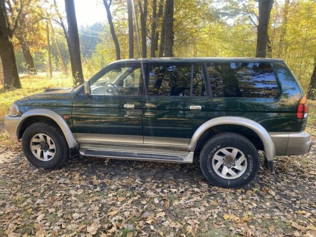 Зеленый Мицубиси Паджеро Спорт, объемом двигателя 2.5 л и пробегом 333 тыс. км за 4900 $, фото 7 на Automoto.ua