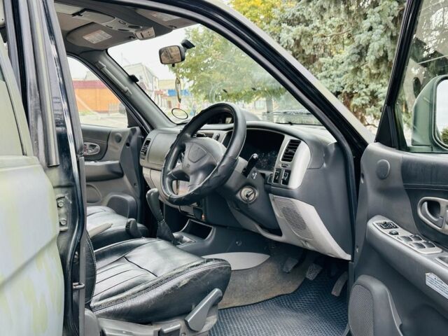 Зеленый Мицубиси Паджеро Спорт, объемом двигателя 2.5 л и пробегом 250 тыс. км за 3850 $, фото 10 на Automoto.ua