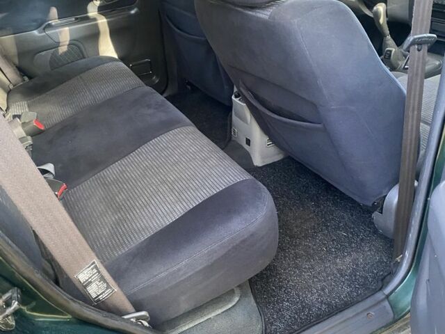 Зеленый Мицубиси Паджеро Спорт, объемом двигателя 2.5 л и пробегом 333 тыс. км за 4900 $, фото 12 на Automoto.ua