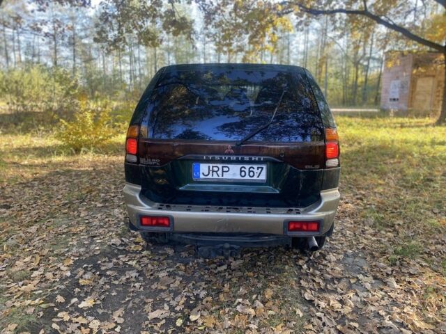 Зеленый Мицубиси Паджеро Спорт, объемом двигателя 2.5 л и пробегом 333 тыс. км за 4900 $, фото 5 на Automoto.ua