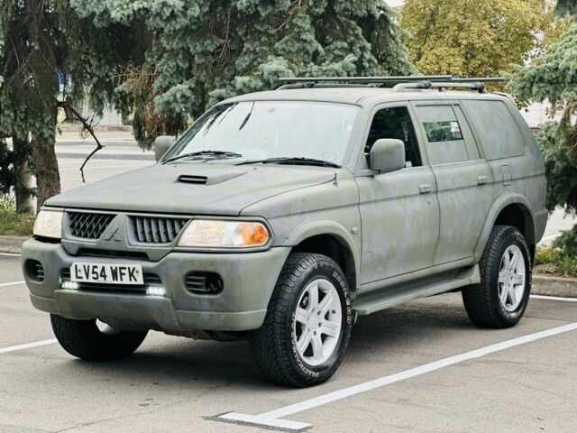 Зеленый Мицубиси Паджеро Спорт, объемом двигателя 2.5 л и пробегом 250 тыс. км за 3850 $, фото 7 на Automoto.ua