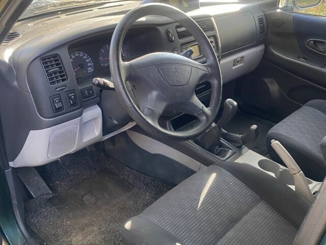 Зеленый Мицубиси Паджеро Спорт, объемом двигателя 2.5 л и пробегом 333 тыс. км за 4900 $, фото 9 на Automoto.ua