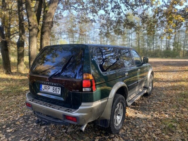 Зеленый Мицубиси Паджеро Спорт, объемом двигателя 2.5 л и пробегом 333 тыс. км за 4900 $, фото 4 на Automoto.ua