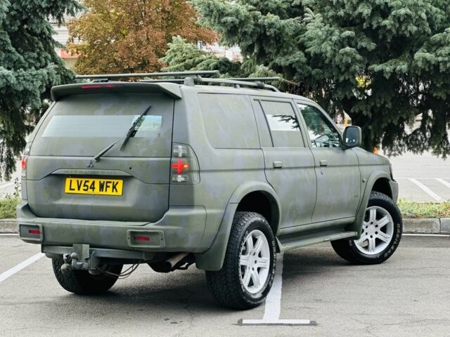 Зеленый Мицубиси Паджеро Спорт, объемом двигателя 2.5 л и пробегом 250 тыс. км за 3850 $, фото 3 на Automoto.ua