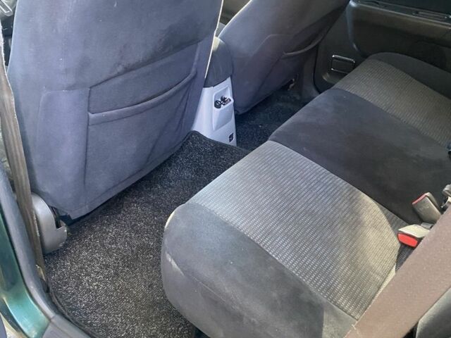 Зеленый Мицубиси Паджеро Спорт, объемом двигателя 2.5 л и пробегом 333 тыс. км за 4900 $, фото 10 на Automoto.ua