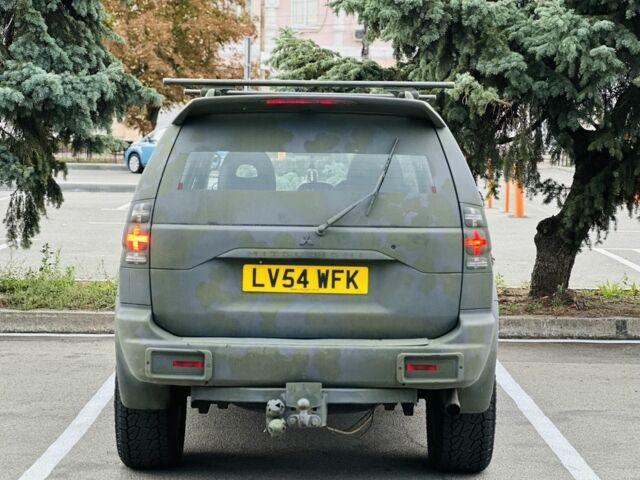 Зеленый Мицубиси Паджеро Спорт, объемом двигателя 2.5 л и пробегом 250 тыс. км за 3850 $, фото 5 на Automoto.ua