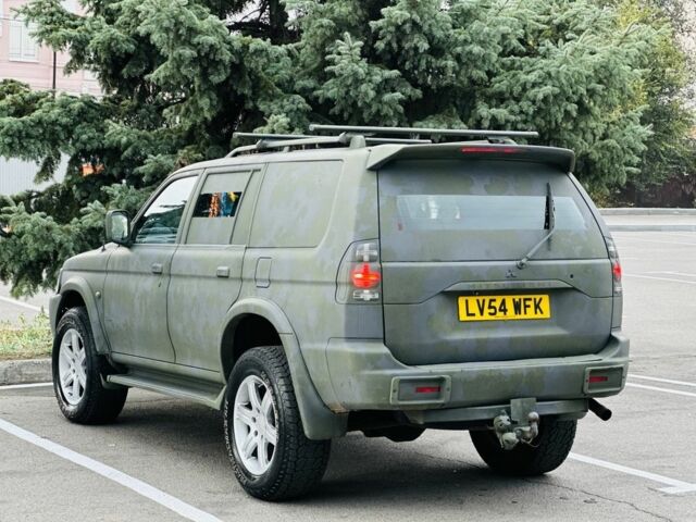 Зеленый Мицубиси Паджеро Спорт, объемом двигателя 2.5 л и пробегом 250 тыс. км за 3850 $, фото 9 на Automoto.ua