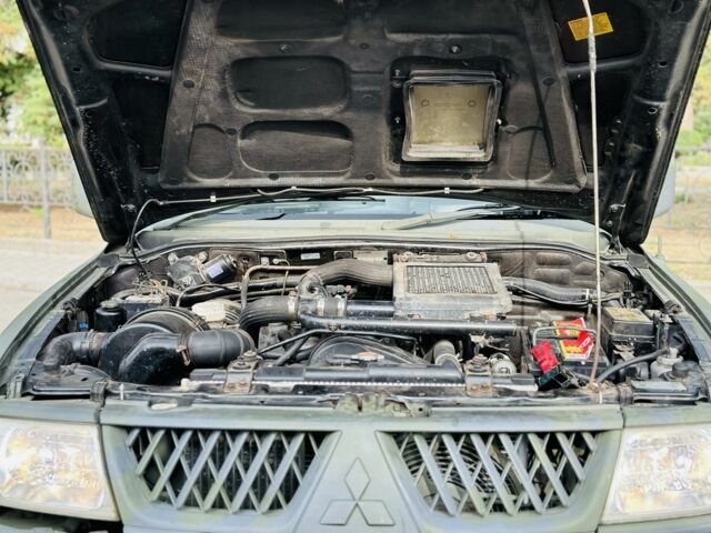 Зеленый Мицубиси Паджеро Спорт, объемом двигателя 2.5 л и пробегом 250 тыс. км за 3850 $, фото 18 на Automoto.ua