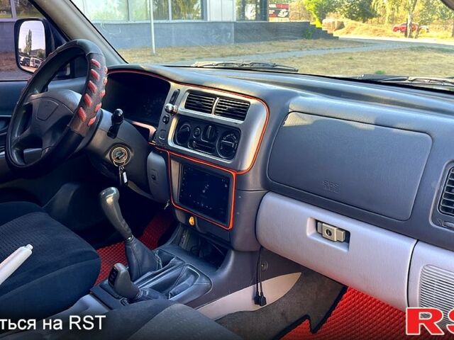 Зеленый Мицубиси Паджеро Спорт, объемом двигателя 2.5 л и пробегом 273 тыс. км за 4900 $, фото 7 на Automoto.ua