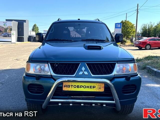 Зеленый Мицубиси Паджеро Спорт, объемом двигателя 2.5 л и пробегом 273 тыс. км за 4900 $, фото 1 на Automoto.ua