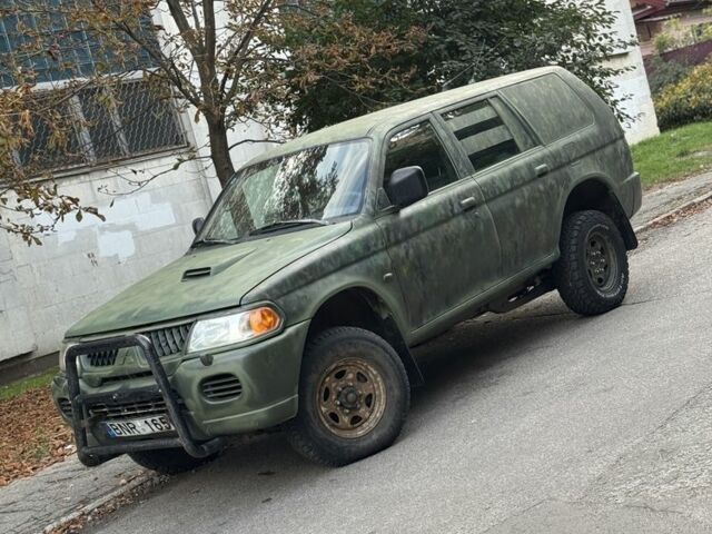 Зеленый Мицубиси Паджеро Спорт, объемом двигателя 2.5 л и пробегом 300 тыс. км за 4999 $, фото 1 на Automoto.ua