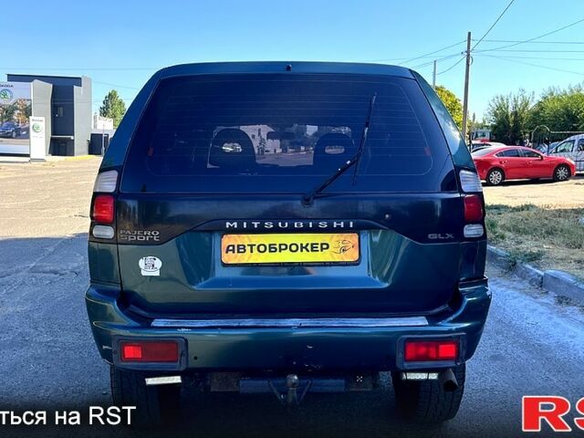 Зеленый Мицубиси Паджеро Спорт, объемом двигателя 2.5 л и пробегом 273 тыс. км за 4900 $, фото 4 на Automoto.ua