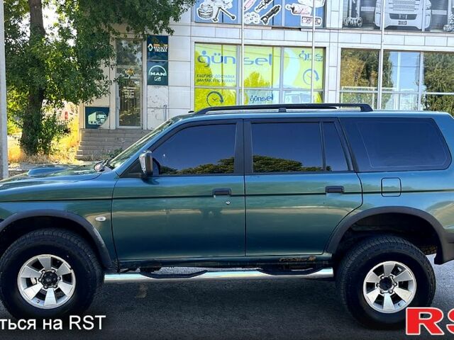 Зеленый Мицубиси Паджеро Спорт, объемом двигателя 2.5 л и пробегом 273 тыс. км за 4900 $, фото 3 на Automoto.ua