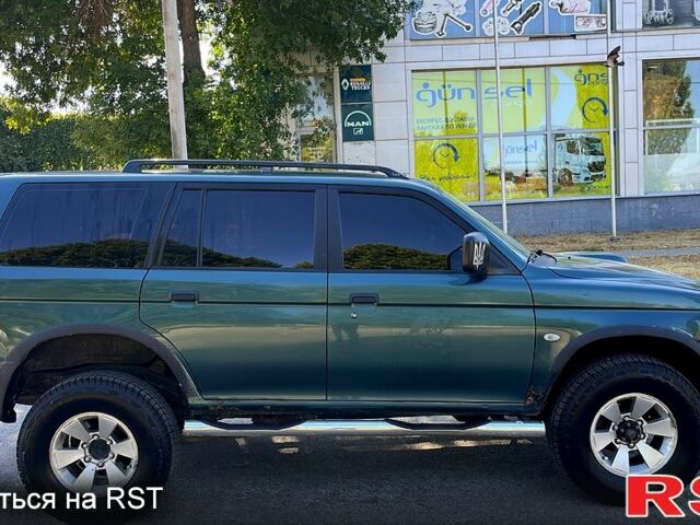 Зеленый Мицубиси Паджеро Спорт, объемом двигателя 2.5 л и пробегом 273 тыс. км за 4900 $, фото 2 на Automoto.ua