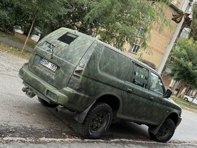 Зеленый Мицубиси Паджеро Спорт, объемом двигателя 2.5 л и пробегом 300 тыс. км за 4999 $, фото 4 на Automoto.ua
