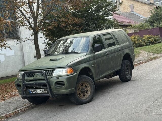 Зеленый Мицубиси Паджеро Спорт, объемом двигателя 2.5 л и пробегом 300 тыс. км за 4999 $, фото 3 на Automoto.ua