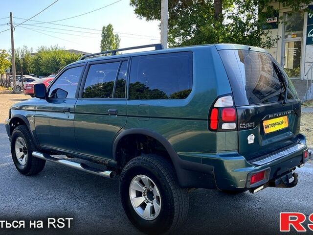 Зеленый Мицубиси Паджеро Спорт, объемом двигателя 2.5 л и пробегом 273 тыс. км за 4900 $, фото 5 на Automoto.ua