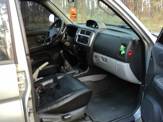 Зеленый Мицубиси Паджеро Спорт, объемом двигателя 2.5 л и пробегом 250 тыс. км за 9500 $, фото 5 на Automoto.ua