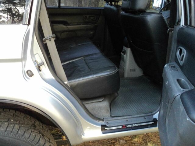 Зеленый Мицубиси Паджеро Спорт, объемом двигателя 2.5 л и пробегом 250 тыс. км за 9500 $, фото 7 на Automoto.ua