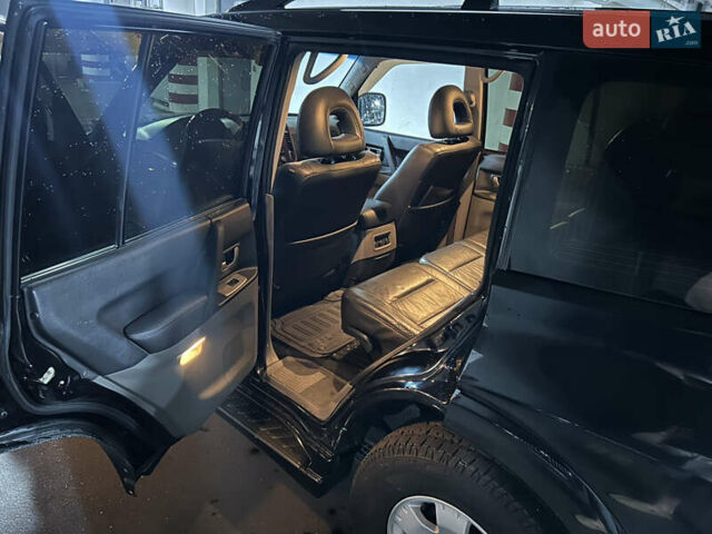 Черный Мицубиси Паджеро Вагон, объемом двигателя 3.2 л и пробегом 254 тыс. км за 10600 $, фото 48 на Automoto.ua