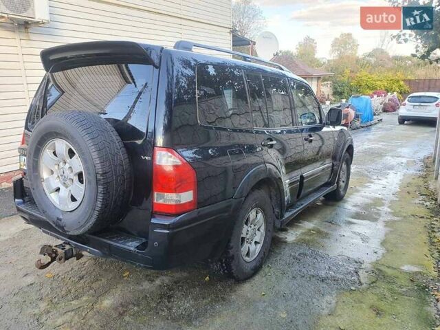 Чорний Міцубісі Паджеро Вагон, об'ємом двигуна 3 л та пробігом 228 тис. км за 12000 $, фото 6 на Automoto.ua