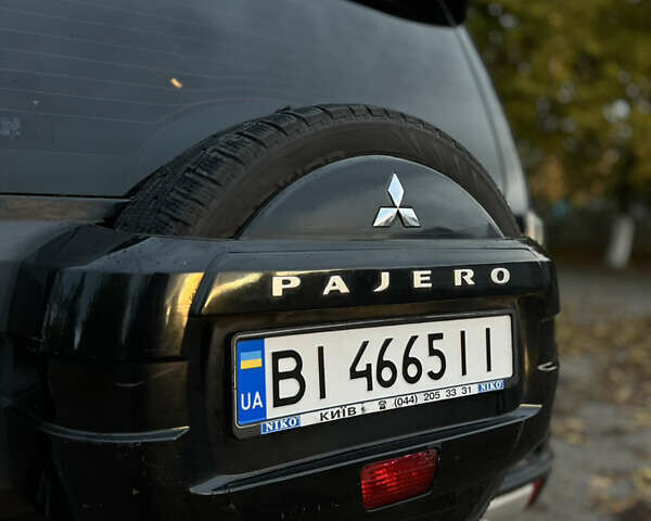 Чорний Міцубісі Паджеро Вагон, об'ємом двигуна 3.8 л та пробігом 208 тис. км за 11500 $, фото 15 на Automoto.ua