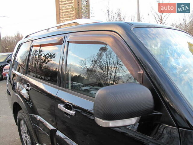 Чорний Міцубісі Паджеро Вагон, об'ємом двигуна 3 л та пробігом 254 тис. км за 10800 $, фото 44 на Automoto.ua