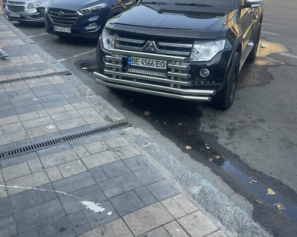 Черный Мицубиси Паджеро Вагон, объемом двигателя 3.83 л и пробегом 315 тыс. км за 12000 $, фото 6 на Automoto.ua