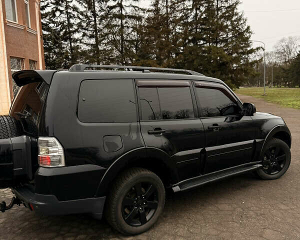 Черный Мицубиси Паджеро Вагон, объемом двигателя 3.83 л и пробегом 218 тыс. км за 10700 $, фото 66 на Automoto.ua