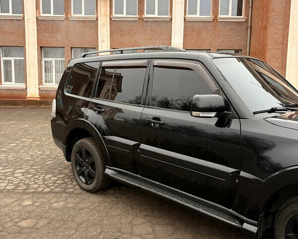 Черный Мицубиси Паджеро Вагон, объемом двигателя 3.83 л и пробегом 218 тыс. км за 10700 $, фото 67 на Automoto.ua