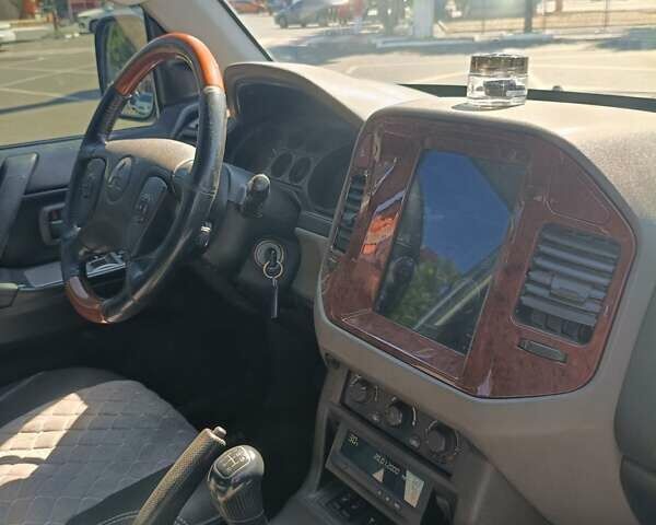 Серый Мицубиси Паджеро Вагон, объемом двигателя 3.2 л и пробегом 298 тыс. км за 10000 $, фото 16 на Automoto.ua