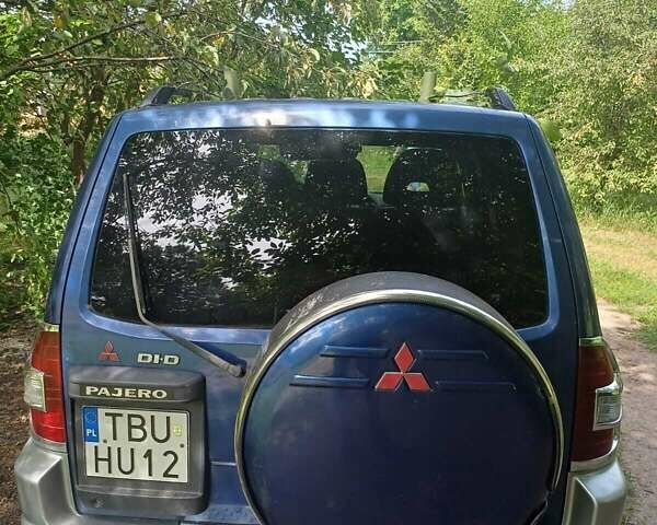 Синій Міцубісі Паджеро Вагон, об'ємом двигуна 3.2 л та пробігом 292 тис. км за 9400 $, фото 3 на Automoto.ua
