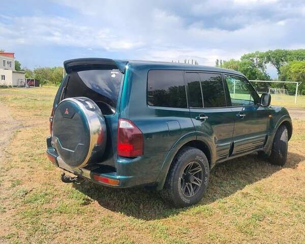 Зеленый Мицубиси Паджеро Вагон, объемом двигателя 3.5 л и пробегом 300 тыс. км за 8000 $, фото 2 на Automoto.ua