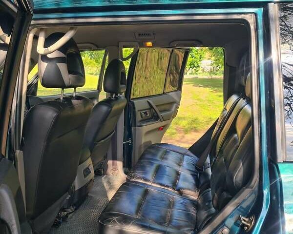 Зеленый Мицубиси Паджеро Вагон, объемом двигателя 3.5 л и пробегом 300 тыс. км за 8000 $, фото 12 на Automoto.ua