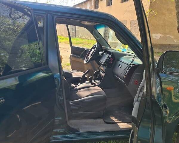 Зеленый Мицубиси Паджеро Вагон, объемом двигателя 3.5 л и пробегом 300 тыс. км за 8000 $, фото 8 на Automoto.ua