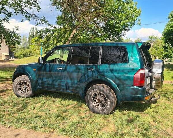 Зеленый Мицубиси Паджеро Вагон, объемом двигателя 3.5 л и пробегом 300 тыс. км за 8000 $, фото 3 на Automoto.ua