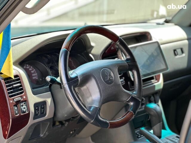 Зеленый Мицубиси Паджеро Вагон, объемом двигателя 3.5 л и пробегом 301 тыс. км за 8290 $, фото 23 на Automoto.ua