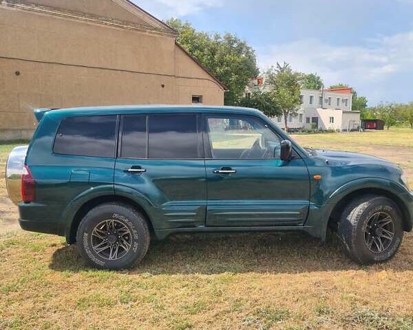 Зеленый Мицубиси Паджеро Вагон, объемом двигателя 3.5 л и пробегом 300 тыс. км за 8000 $, фото 15 на Automoto.ua