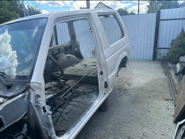 Белый Мицубиси Паджеро, объемом двигателя 3 л и пробегом 280 тыс. км за 6400 $, фото 8 на Automoto.ua