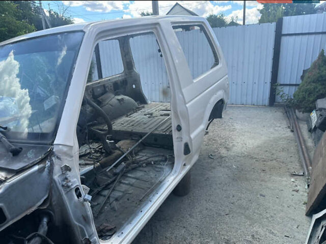 Білий Міцубісі Паджеро, об'ємом двигуна 2.97 л та пробігом 280 тис. км за 7400 $, фото 10 на Automoto.ua