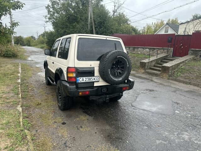 Белый Мицубиси Паджеро, объемом двигателя 3 л и пробегом 280 тыс. км за 6400 $, фото 5 на Automoto.ua