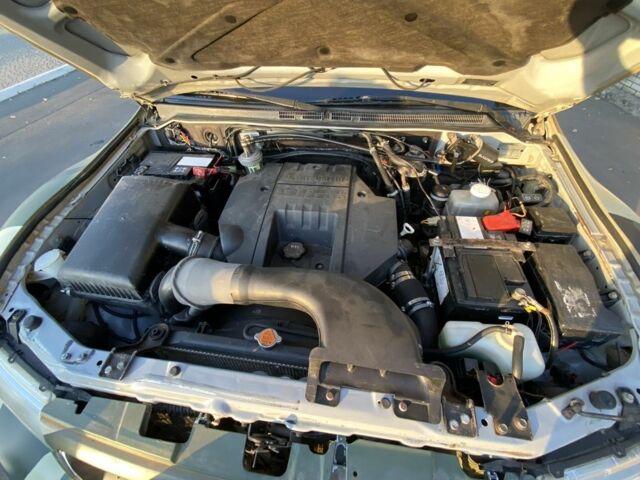 Бежевий Міцубісі Паджеро, об'ємом двигуна 3.2 л та пробігом 184 тис. км за 17275 $, фото 4 на Automoto.ua