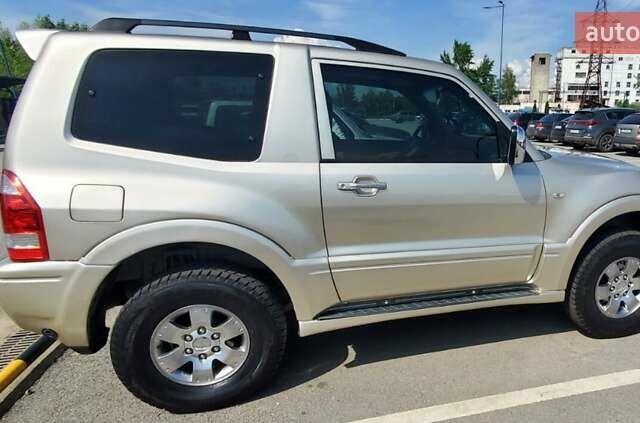 Бежевий Міцубісі Паджеро, об'ємом двигуна 2.97 л та пробігом 187 тис. км за 12900 $, фото 3 на Automoto.ua
