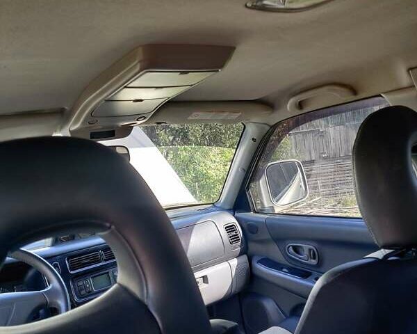 Бежевий Міцубісі Паджеро, об'ємом двигуна 3 л та пробігом 187 тис. км за 8900 $, фото 17 на Automoto.ua