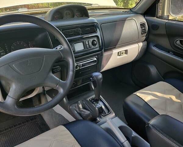 Бежевий Міцубісі Паджеро, об'ємом двигуна 3 л та пробігом 187 тис. км за 8900 $, фото 19 на Automoto.ua