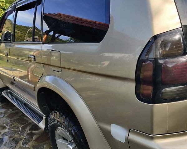 Бежевий Міцубісі Паджеро, об'ємом двигуна 3 л та пробігом 187 тис. км за 8900 $, фото 16 на Automoto.ua
